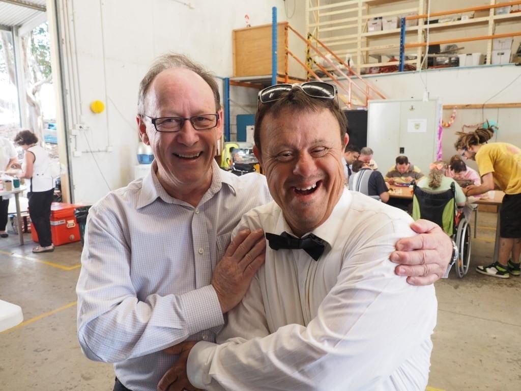 Myhorizon CEO Joe Gamblin with participant in packaging and mailhouse room